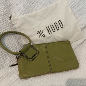 Hobo Wristlet Wallet green in color in excellent condition along with bag
